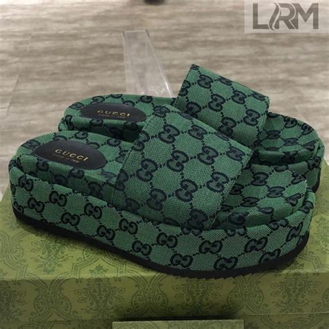 gucci gg guccissima slides|green Gucci platform slides.